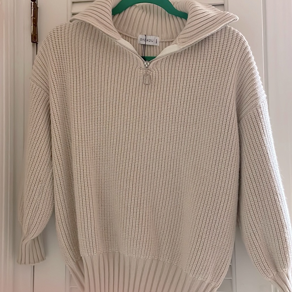Quarter zip sweater, great quality, comfortable , worn once
